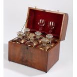 19th Century mahogany decanter box, the piano top hinged lid opening to reveal six decanters and two