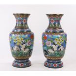 Very large and decorative pair of Chinese cloisonné vases, with a blue ground and rows of