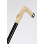 SIlver mounted ivory walking stick, the silver cap London 1916, makers mark rubbed, the handle