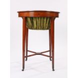 George III mahogany and satinwood work table the oval top above a velvet drop basket and slender