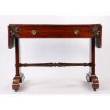 William IV rosewood sofa table, the rectangular top with drop end flaps above a frieze drawer and