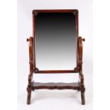 Victorian mahogany cheval mirror, the rectangular mirror plate held within a moulded frame and