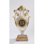 Empire glass vase clock with ormolu mounts, the removable cover with prismatic finial and flanked by