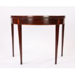 George III mahogany bowfront games table, the hinged bowfront top with a rosewood crossbanded edge
