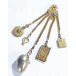 Gilt Metal Chatelaine, the monogram form clip above five chains with pincushion, folding button