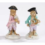 Two Dresden porcelain monkey band figures, 20th century, after the 18th century Meissen models by