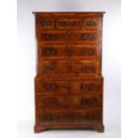 George II walnut and burr walnut chest on chest, circa 1735, the moulded cornice above three short