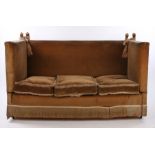 Early to mid 20th Century Knole type settee, the high back and drop sides above three cushions and a