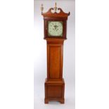 19th Century oak longcase clock, the swan neck pediment above the square glazed hood flanked by