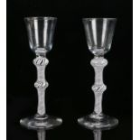 Near pair of George III cordial glasses, the bell shaped bowl with a double knopped air twist stem