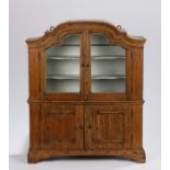 19th Century oak miniature cabinet, the arched plinth top above a pair of glazed doors enclosing
