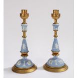 Pair of 19th Century Wedgwood Jasperware and gilt metal mounted candlesticks, the gilt sconces above