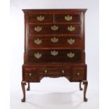 George III and later mahogany chest on stand, the concave cornice above two short and three long