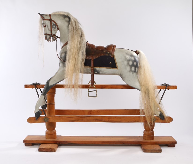 Fine F.H. Ayres rocking horse, circa 1915, large size, dapple grey with leather saddle, horse hair