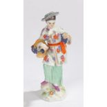 19th Century Meissen porcelain figure, after Frederich Elias Meyer, of a figure selling grapes,