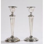 Pair of Edward VII silver candlesticks, Birmingham 1905, maker William Hutton & Sons Ltd, with shell