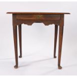 George III oak lowboy, the rectangular top above a slender frieze drawer and undulating frieze on