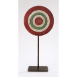 Early 20th Century fairground miniature dart board, raised on an iron stand, 51cm high including the
