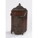French carved walnut candle box, with acanthus leaf and flower head carved pediment above a