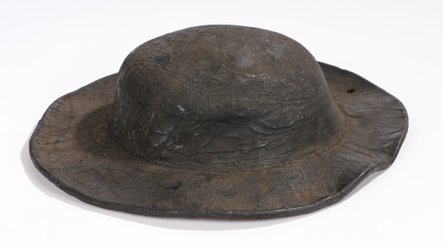 19th Century leather miners helmet. The domed top above a broad rim