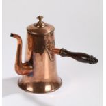 George III copper coffee pot, the turned walnut handle attached to the shaped pot and long arched