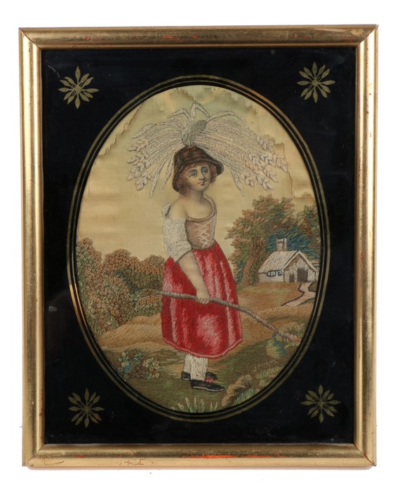 Early 19th Century silk work of a girl, standing in a lane near a cottage, inscribed on the back and