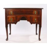 George III oak lowboy, the rectangular top above one long and two short drawers above the shaped