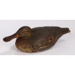 Early 20th Century Folk Art straw decoy duck, with orange eyes and black streaks to the deep brown