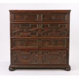 Charles II oak geometric chest of drawers, the rectangular top above four long geometric drawers