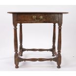 Late 17th Century oak side table, the rectangular top above a frieze drawer and turned supports