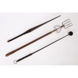 Collection of implements, to include an 18th Century ebony handled ladle, an 18th Century head