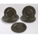 Four 18th Century pewter plates, to include a pair with touch marks for A&H and three with London