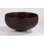 Early 20th Century painted pine bowl, with flower head and geometric circular decoration, 36.5cm