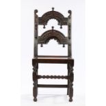 Charles II Oak Derbyshire chair, circa 1660 – 1680. The twin arcaded back panel carved with