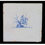 18th Century blue and white Delft tile, depicting a horseman passing a tree, 12.6cm x 12.6cm