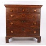 George III oak Norfolk chest of drawers, the rectangular top above three short and three long