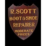 Victorian double sided shoe repair shop sign, in the form of a shield and the yellow lettering R.