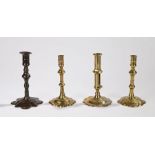 Collection of candlesticks, to include an 18th Century brass petal base example, another, an example