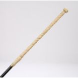 French 19th Century Dieppe ivory cane, the long grape and vine handle above the slender cane, 92cm