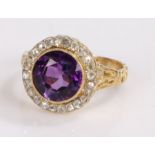 Amethyst and diamond set ring, the central amethyst at 2.73 carats and a diamond surround, ring size