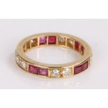 18 carat gold diamond and ruby set eternity ring, with interspersed pairs of rubies and diamonds,