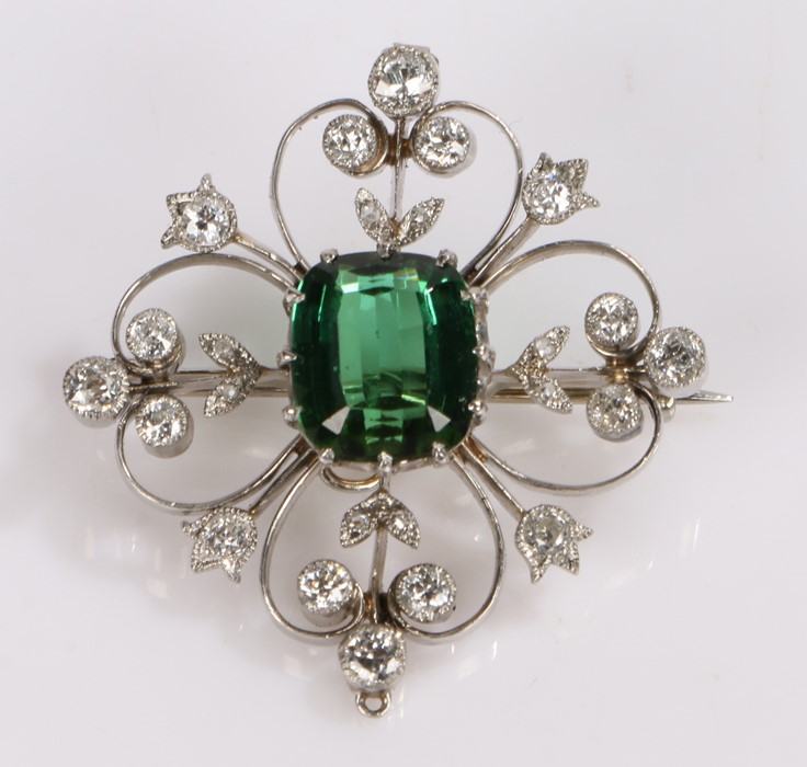 Tourmaline and diamond set brooch, the central 4.10 carat tourmaline with a diamond surround on