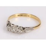 18 carat gold diamond set ring, with three diamonds to the head, ring size N