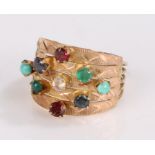 Gold multi stone set ring, the wide head set with an arrangement of stones, ring size K1/2