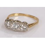 18 carat gold diamond set ring, with three round cut diamonds to the head, ring size P