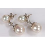 Pair of pearl and diamond set earrings, the drops with two pearls set with diamonds to the link