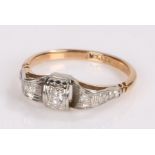 9 carat gold diamond set ring, the head with three diamonds set in platinum, ring size L1/2