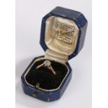 18 carat gold diamond solitaire ring, the round cut diamond at approximately 0.50 carat, ring size