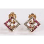 Pair of Art Deco earrings, with a central pearl with a diamond and ruby surround, 10mm diameter