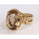 18 carat gold smoky quartz ring, with an oval facetted smoky quartz to the head, ring size J